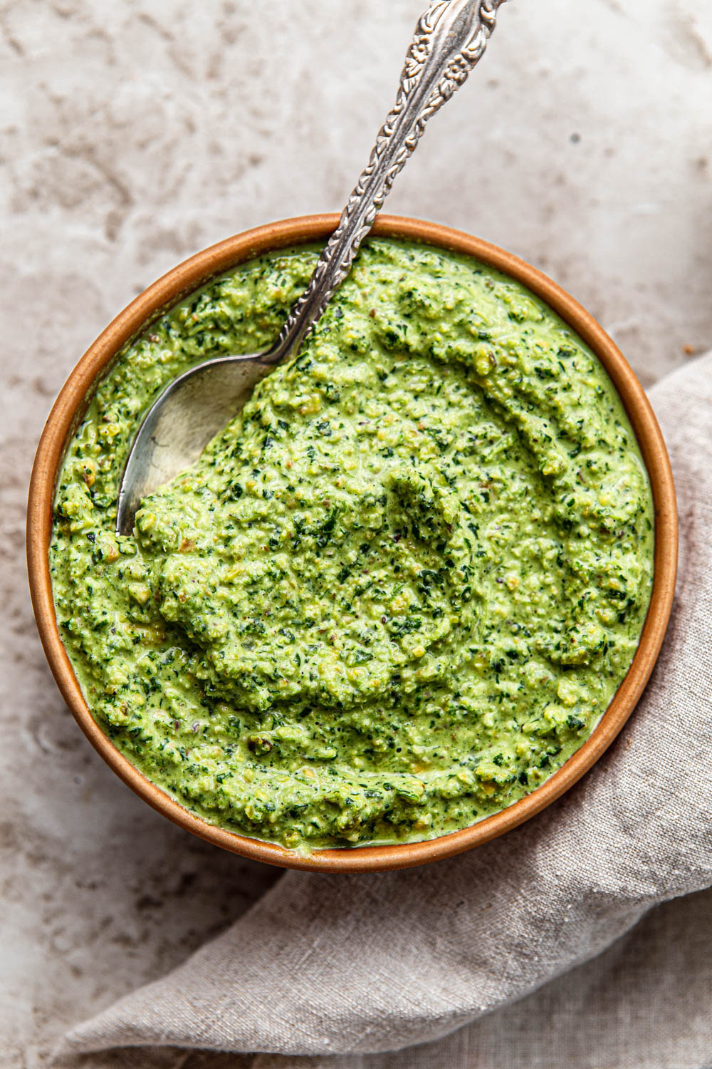 green pesto sauce made with kale and pistachios