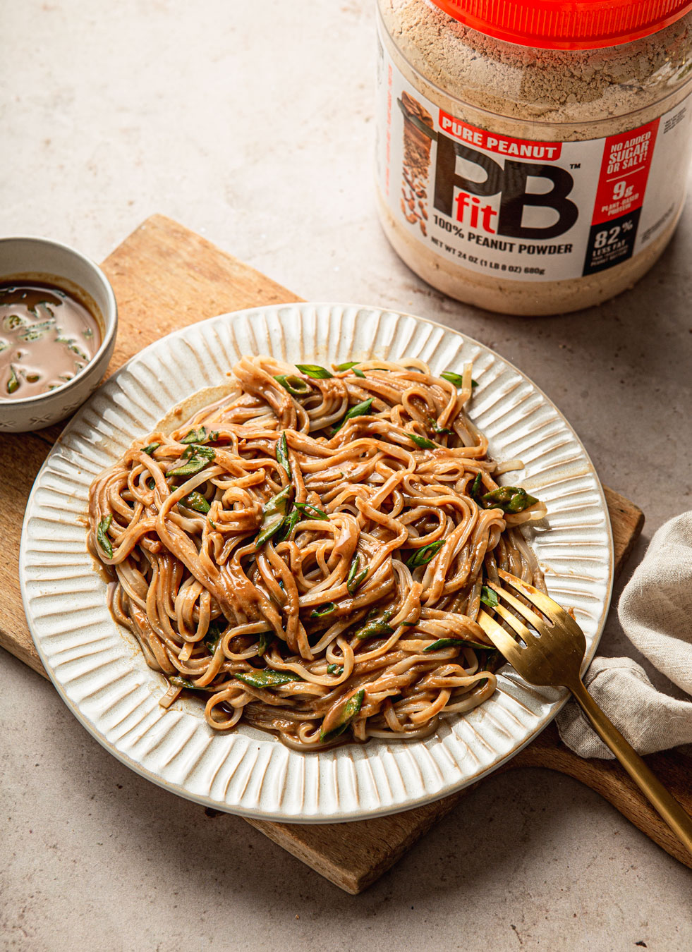 rice noodles with peanut sauce and scallions 