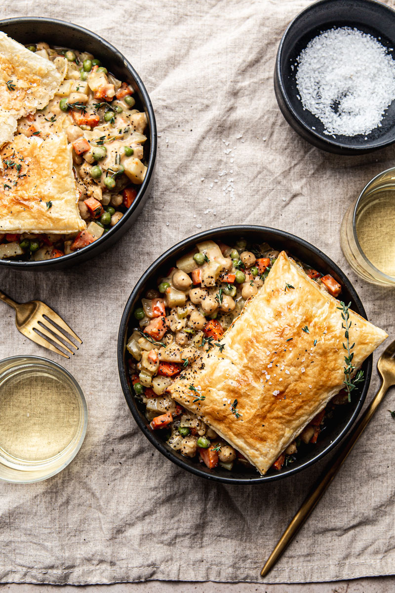 vegan chickpea pot pie topped with puff pastry squares food photography