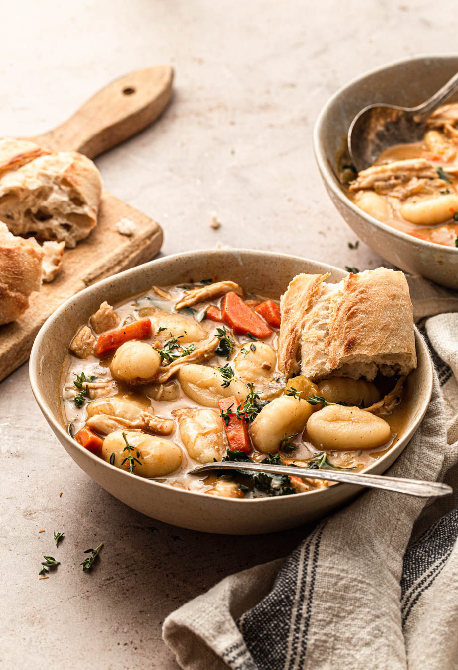 Creamy Chicken Gnocchi Soup (dairy-free) with french baguette food photography