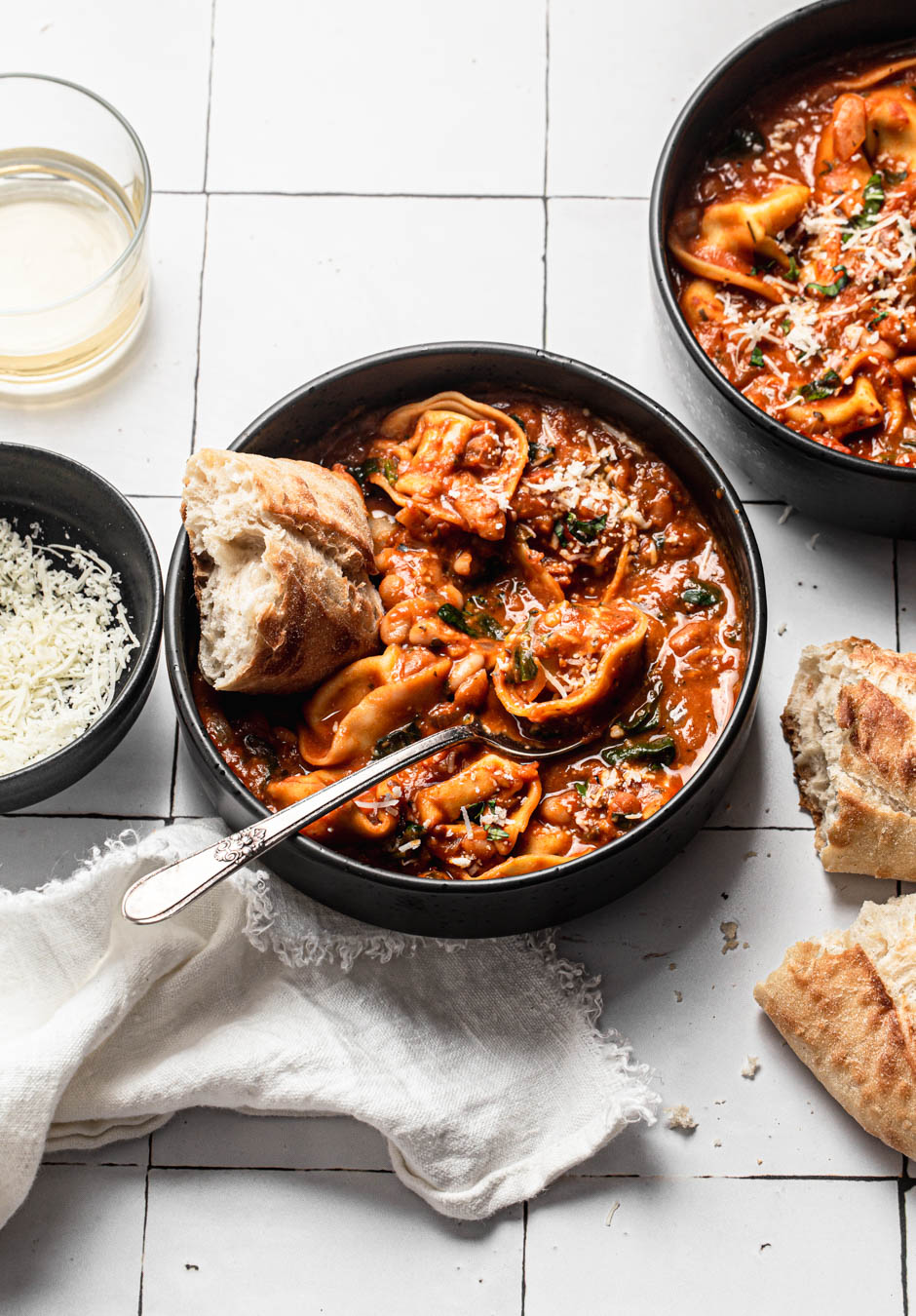 creamy tuscan tortellini soup with sourdough food styling