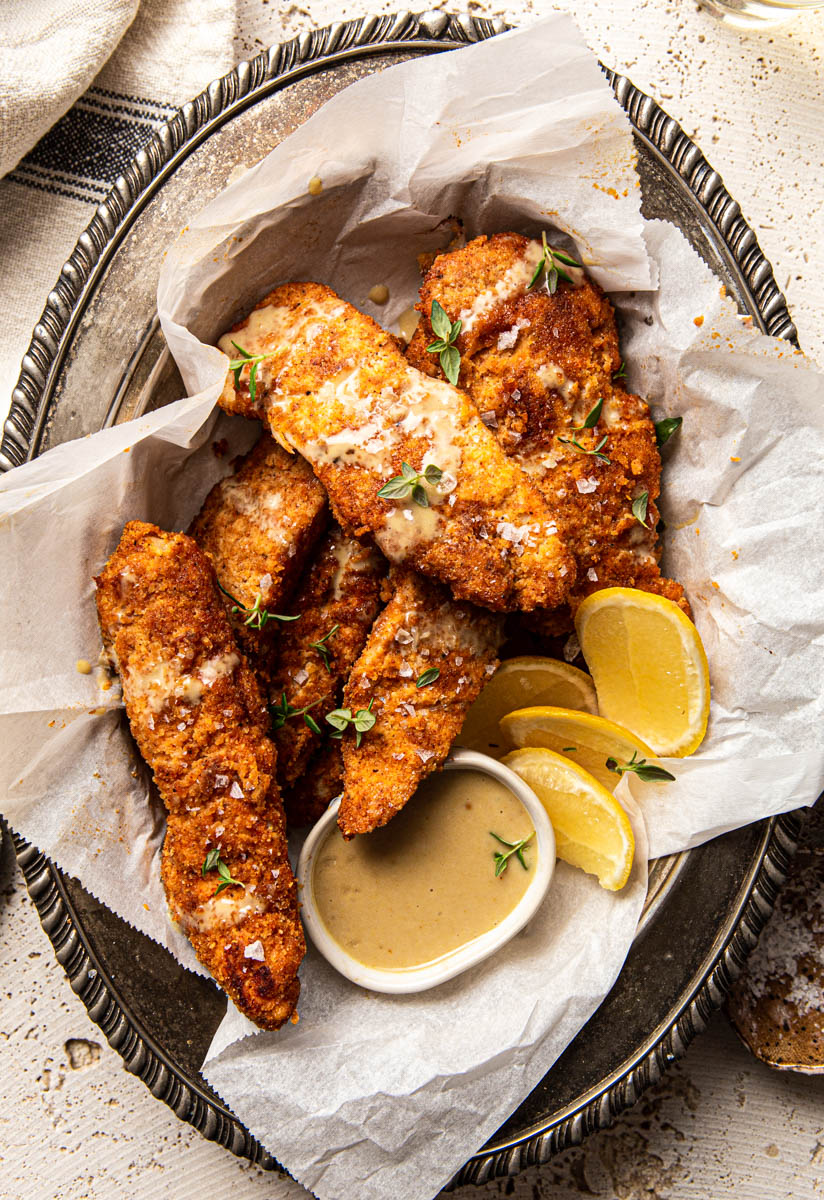paleo  healthy chicken tenders with lemon food photography