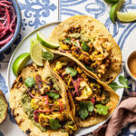 roasted cauliflower tacos with pickled onions, cilantro pesto and chipotle crema natteats