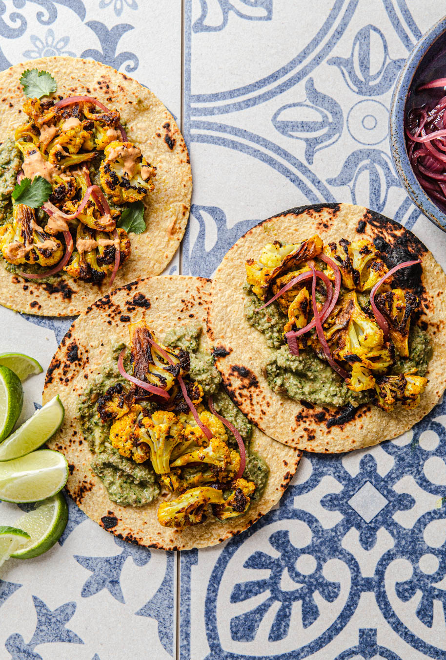 best cauliflower tacos with cilantro pesto and red pickled onions food styling