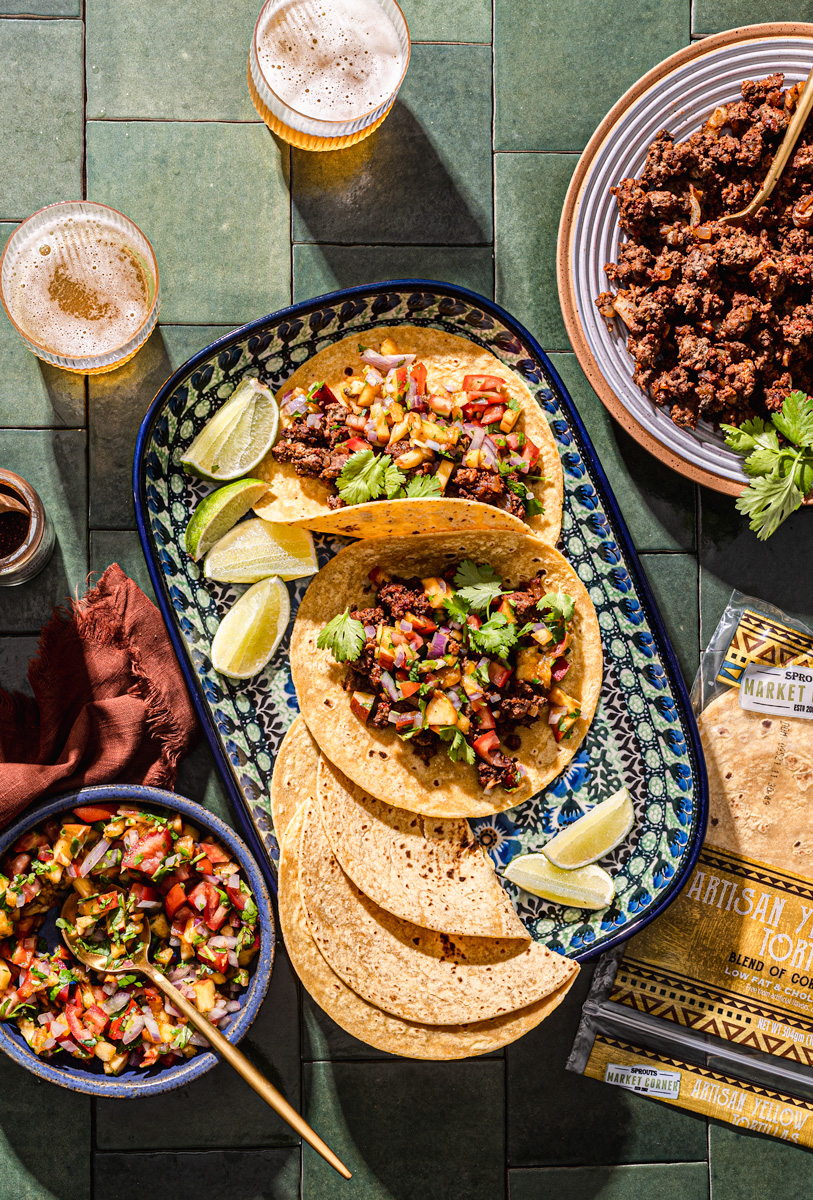 spicy chipotle beef tacos with peach salsa
