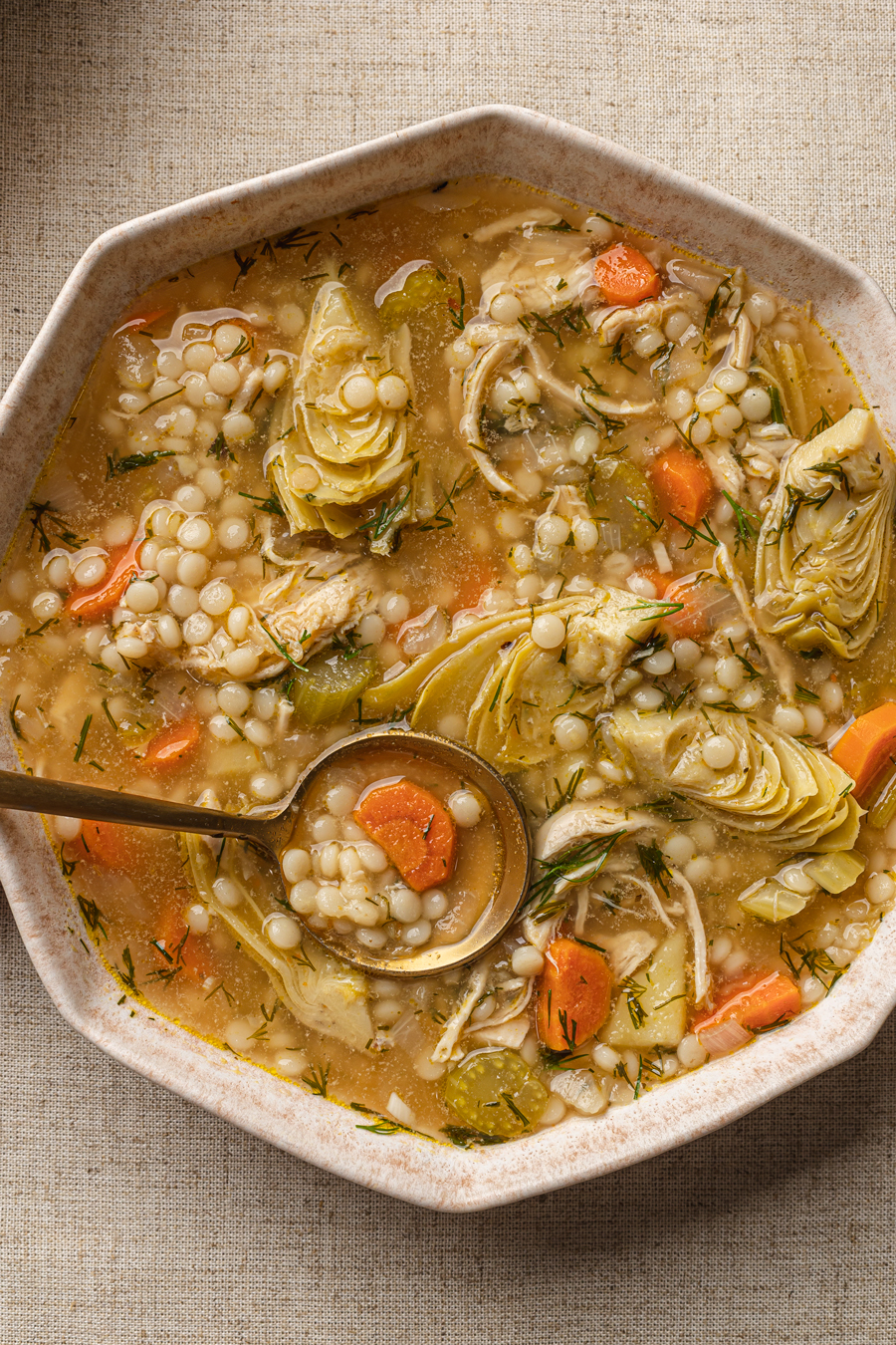 chicken soup with couscous food photography